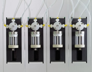 Chemical Purification Liquid-Liquid-Extraction Automation - Zinsser Analytic - syringe pumps